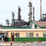 A picture taken on January 14, 2017, shows the entrance of an oil refinery of Gabonese Refining Company SOGARA in Port-Gentil, central western Gabon. [Justin Tallis/ AFP)