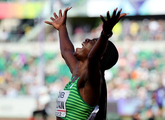 Athletics - World Athletics Championships - Women's 100 Metres Hurdles - Semi Final - Hayward Field, Eugene, Oregon, U.S. - July 24, 2022 Nigeria's Tobi Amusan celebrates after setting a new world record and winning her semi final REUTERS/Lucy Nicholson