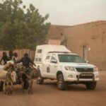 UN policemen escort an armoured car of the United Nations Stabilisation Mission in Mali (MINUSMA) during a patrol in Timbuktu on December 8, 2021. © Florent Vergnes, AFP