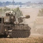 Israeli artillery vehicle near Sderot on the Israeli-Gaza border, August 6, 2022. © Ilia Yefimovich / Picture Alliance / Getty Images