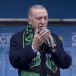 Turkish President and Leader of Justice and Development (AK) Party Recep Tayyip Erdogan addresses the crowd during his party's election rally prior to the municipal elections in Kilis, Turkiye on March 21, 2024. © Muhammed Selim Korkutata/Getty Images