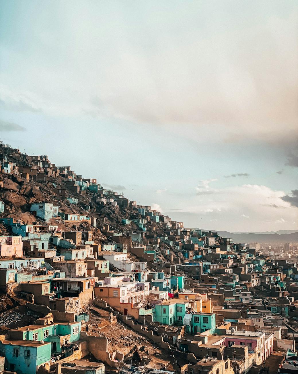 old town with colorful buildings on hill slope