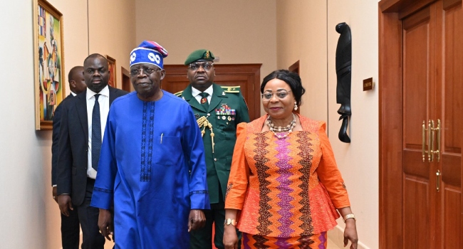 Equatorial Guinea Prime Minister Manuela Roka Botey (R) receives President Bola Tinubu (L) in Malabu on August 14, 2024