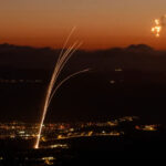 Rockets fired from southern Lebanon are intercepted by Israel's Iron Dome air defence system over the Upper Galilee region in northern Israel on August 23, 2024 [Jalaa Marey/AFP]