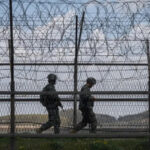 South Korean soldiers patrol in the demilitarized zone (DMZ) along the border [File: Ed Jones/AFP]