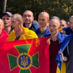 Freed Ukrainian prisoners of war at an unknown location in Ukraine, on August 24 [Handout/Ukraine's President Volodymyr Zelenskyy via Reuters]