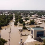 This screenshot shows the aerial view of houses submerged under water in Maiduguri on September 10, 2024. (Credit: Chima Onwe/UNOCHA)