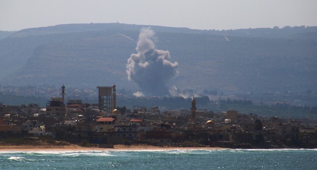 Smoke billows after an Israeli strike on the area of el-Hosh near port city of Tyre in southern Lebanon on September 24, 2024. (Photo by HASSAN FNEICH / AFP)