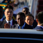 Togo’s President Faure Gnassingbe (C) arrives at Beijing Capital International Airport in Beijing on September 1, 2024. (Photo by Ken Ishii / POOL / AFP)