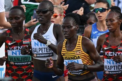 FILES) (From L to R) Kenya’s Rosemary Wanjiru, Israel’s Lonah Chemtai Salpeter, Uganda’s Rebecca Cheptegei and Kenya’s Selly Chepyego Kaptich compete in the women’s marathon final during the World Athletics Championships in Budapest on August 26, 2023. (Photo by Ferenc ISZA / AFP)