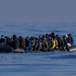 FILE PHOTO: An inflatable boat carrying migrants crosses the English Channel on March 06, 2024. © Getty Images / Dan Kitwood