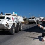 Armoured personnel carriers of the UN Interim Force in Lebanon depart a base to patrol near the Lebanon-Israel border © Getty Images / Carl Court