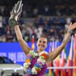 Belarus’ Aryna Sabalenka poses with the trophy after winning the women’s singles final against China’s Zheng Qinwen at the Wuhan Open tennis tournament in Wuhan, China’s Hubei province on October 13, 2024. (Photo by WANG Zhao / AFP)