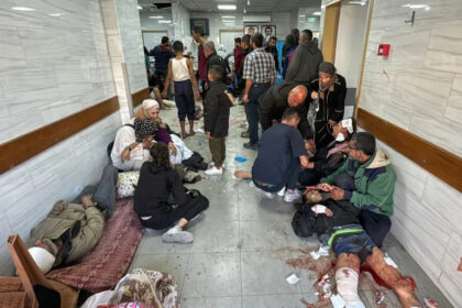 Palestinians injured in Israel’s bombardment of the Beit Lahiya Project residential building await treatment at the Kamal Adwan Hospital on October 23, 2024 [AFP]