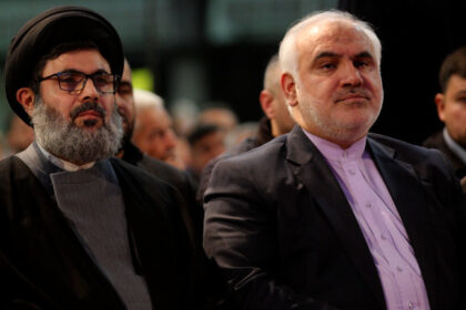 Hezbollah official Hashem Safieddine (L) and Iranian ambassador to Lebanon Mohammad Fathali at a ceremony in Beirut, Lebanon, February 16, 2018. © Getty Images