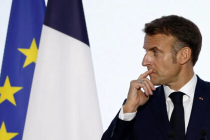 Macron speaks during a press conference at the 19th Francophonie Summit at the Grand Palais in Paris