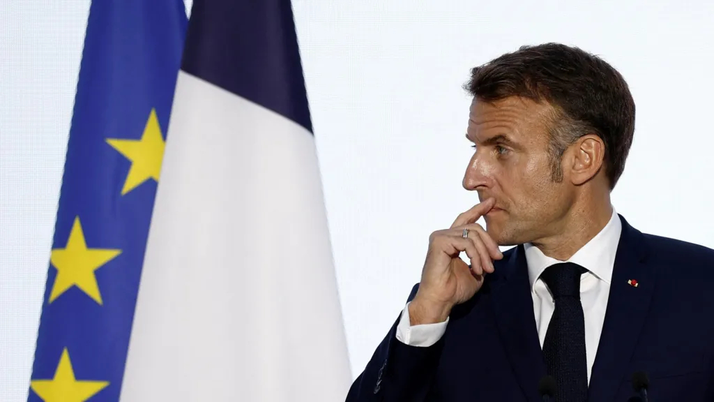 Macron speaks during a press conference at the 19th Francophonie Summit at the Grand Palais in Paris