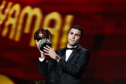 Manchester City’s Spanish midfielder Rodri receives the Ballon d’Or award during the 2024 Ballon d’Or France Football award ceremony at the Theatre du Chatelet in Paris on October 28, 2024. (Photo by FRANCK FIFE / AFP)