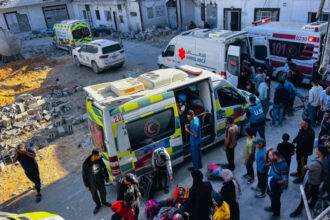 Medics evacuate injured people and cancer patients from the Kamal Adwan Hospital in Beit Lahiya in the northern Gaza Strip [File: AFP]