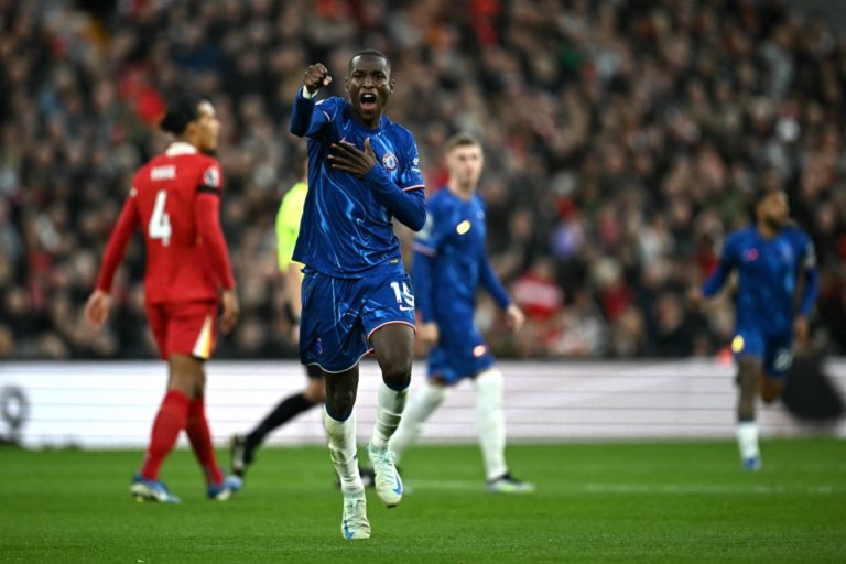 Nicolas Jackson celebrates scoring the team’s first goal during the English Premier League football match between Liverpool and Chelsea at Anfield in Liverpool, north west England on October 20, 2024. (Photo by Paul ELLIS / AFP)