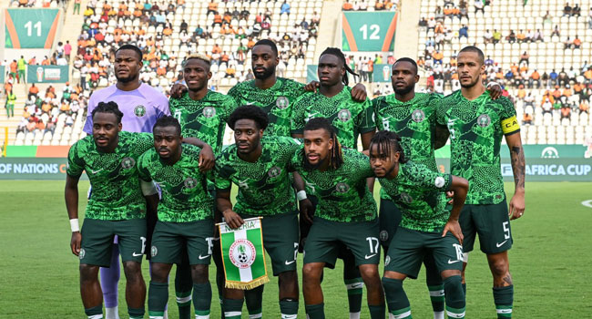 FILE: Nigeria’s players pose ahead of the Africa Cup of Nations (CAN) 2023 semi-final football match between Nigeria and South Africa at the Stade de la Paix in Bouake on February 7, 2024. (Photo by Issouf SANOGO / AFP)