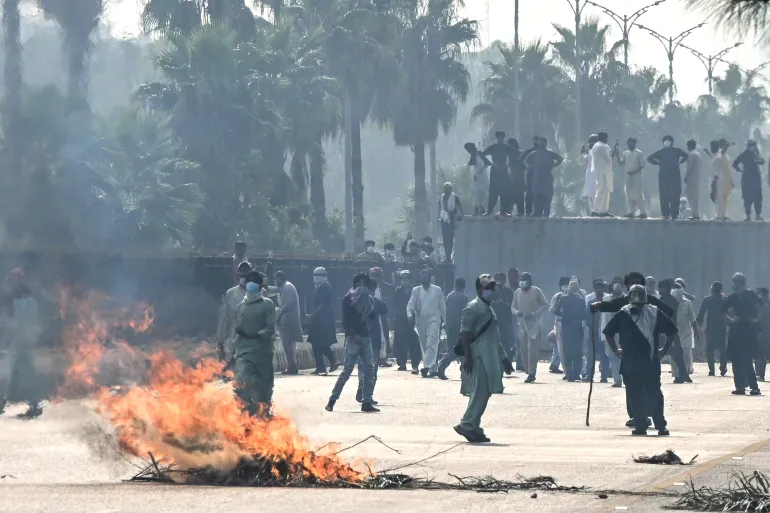 Supporters and activists of former Prime Minister Imran Khan's Pakistan Tehreek-e-Insaf (PTI) party take part in a protest in Islamabad on October 5, 2024 [Farooq Naeem / AFP]