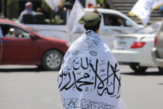 Taliban members celebrate the third anniversary of their takeover of Afghanistan in Kabul, August 14, 2024. © Bilal Guler / Anadolu / Getty Images