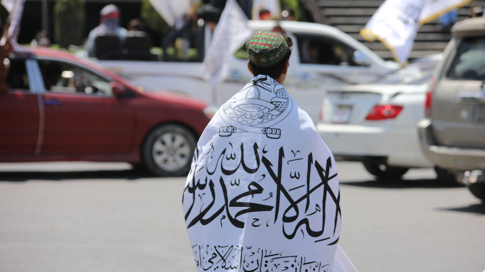 Taliban members celebrate the third anniversary of their takeover of Afghanistan in Kabul, August 14, 2024. © Bilal Guler / Anadolu / Getty Images