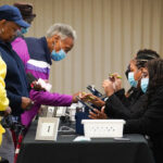 US voters cast ballots during the early voting at East Point First Mallalieu United Methodist Church in Atlanta, Georgia, October 15, 2024. © Getty Images / Megan Varner