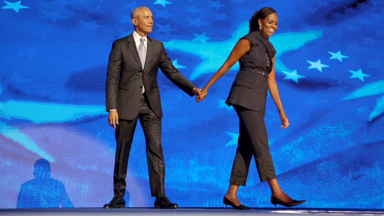 Former President Barack Obama and former first lady Michelle Obama at the Democratic National Convention in August 2024. © Robert Gauthier/Los Angeles Times via Getty Images