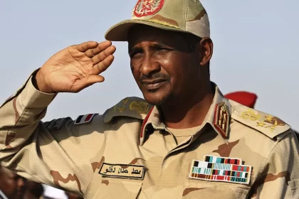 General Mohammed Hamdan Dagalo, then deputy head of the military council, salutes at a rally, in Galawee, northern Sudan,