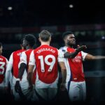 Arsenal’s Ghanaian midfielder #05 Thomas Partey (R) celebrates after scoring his team second goal during the English Premier League football match between Arsenal and Nottingham Forest at the Emirates Stadium in London on November 23, 2024. (Photo by BENJAMIN CREMEL / AFP)