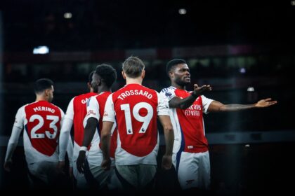 Arsenal’s Ghanaian midfielder #05 Thomas Partey (R) celebrates after scoring his team second goal during the English Premier League football match between Arsenal and Nottingham Forest at the Emirates Stadium in London on November 23, 2024. (Photo by BENJAMIN CREMEL / AFP)