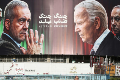 Banner depicting Iranian President Pezeshkian and Chief of Staff Baqeri opposite US President Biden and Israeli PM Netanyahu, Tehran, October 28, 2024. © Getty Images / Fatemeh Bahrami/Anadolu