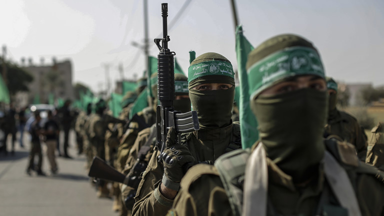 File photo: Hamas members during a military demonstration against Israel in southern Gaza. © Yousef Masoud/Getty Images