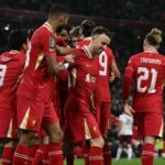 Liverpool’s Portuguese striker #20 Diogo Jota (2-R) celebrates with his team after scoring a goal during the English League Cup third round football match between Liverpool and West Ham United at Anfield in Liverpool, north west England on September 25, 2024. (Photo by Paul ELLIS / AFP)