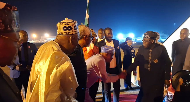 President Bola Tinubu greets FCT Minister, Nyesom Wike, in Abuja upon his arrival from Brazil where he attended the G20 Leaders’ Summit.