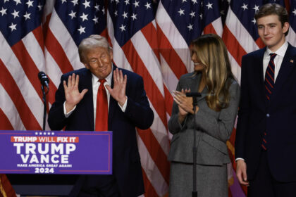 Republican presidential candidate Donald Trump with wife Melania Trump and son Baron Trump during an election night event in West Palm Beach, Florida. © Getty Images / Joe Raedle