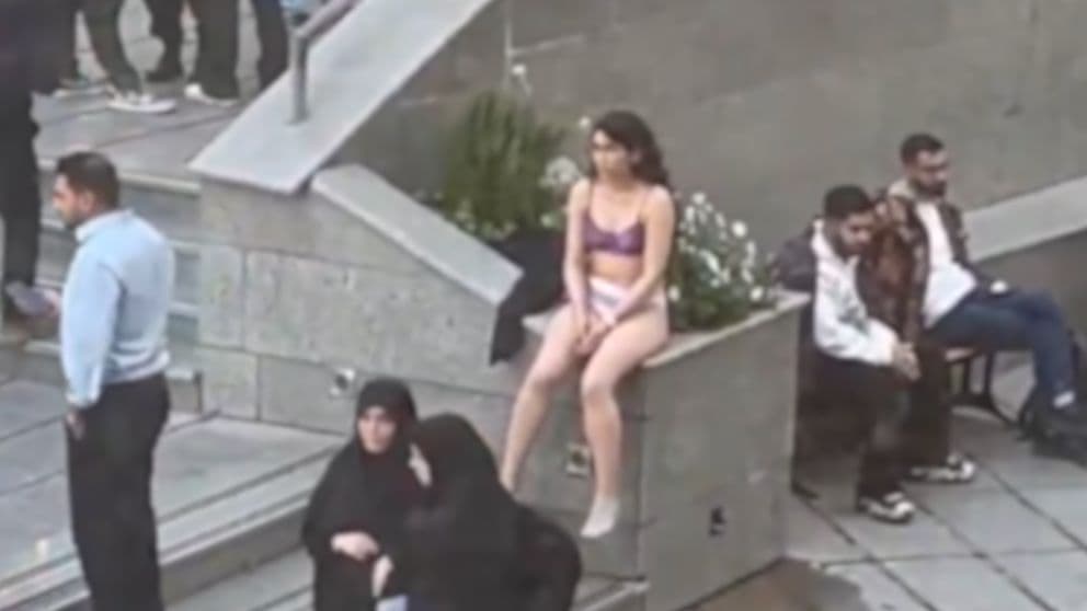 Screenshot of the video showing the female student disrobing at Tehran's Azad University.