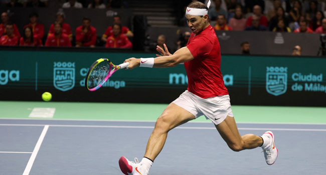 Spain’s Rafael Nadal returns a shot to Netherlands’ Botic van de Zandschulp in the quarter-final singles match between Netherlands and Spain during the Davis Cup Finals at the Palacio de Deportes Jose Maria Martin Carpena arena in Malaga, southern Spain, on November 19, 2024. (Photo by Thomas COEX / AFP)