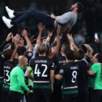 Sporting Lisbon’s Portuguese coach Ruben Amorim is celebrated by his players at the end of the UEFA Champions League, league phase day 4 football match between Sporting Lisbon and Manchester City at the Jose Alvalade stadium in Lisbon on November 5, 2024. (Photo by FILIPE AMORIM / AFP)