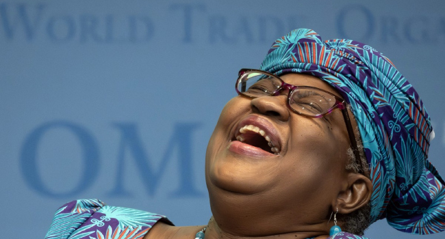 World Trade Organization (WTO) Director-General Ngozi Okonjo-Iweala reacts during a “Making trade score for women!” discussion on football as a tool for trade and development at the WTO headquarters in Geneva, on May 1, 2023. (Photo by Fabrice COFFRINI / AFP)