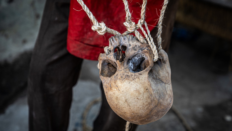 FILE PHOTO. A human skull used for a voodoo burial service pictured in Port-au-Prince, Haiti. © Getty Images / Giles Clarke