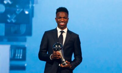 Brazilian forward Vinicius Junior poses with the Best Player trophy during the Best FIFA Football Awards 2024 ceremony in Doha on December 17, 2024. (Photo by Karim JAAFAR / AFP)