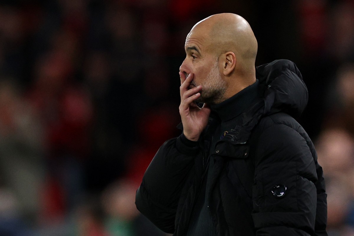 Manchester City’s Spanish manager Pep Guardiola watches the players from the touchline during the English Premier League football match between Liverpool and Manchester City at Anfield in Liverpool, north west England on December 1, 2024. (Photo by Adrian Dennis / AFP) / /