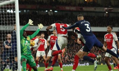 Manchester United’s Cameroonian goalkeeper #24 Andre Onana concedes a second goal during the English Premier League football match between Arsenal and Manchester United at the Emirates Stadium in London on December 4, 2024. (Photo by Adrian Dennis / AFP)