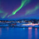 FILE PHOTO: Polar lights over Ilulissat, Greenland © Getty Images / nevereverro