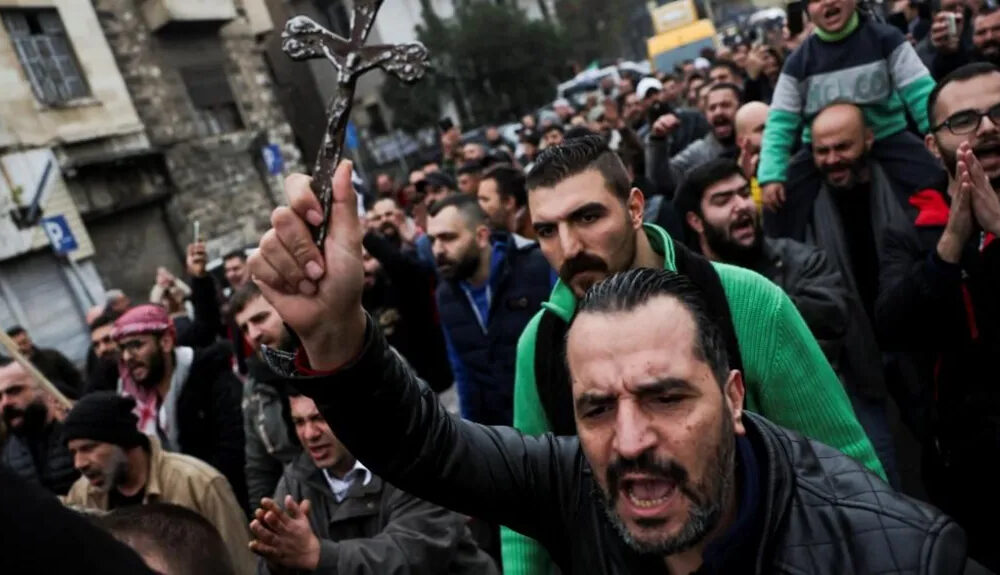 Reuters: Protesters chanted as they marched through Damascus