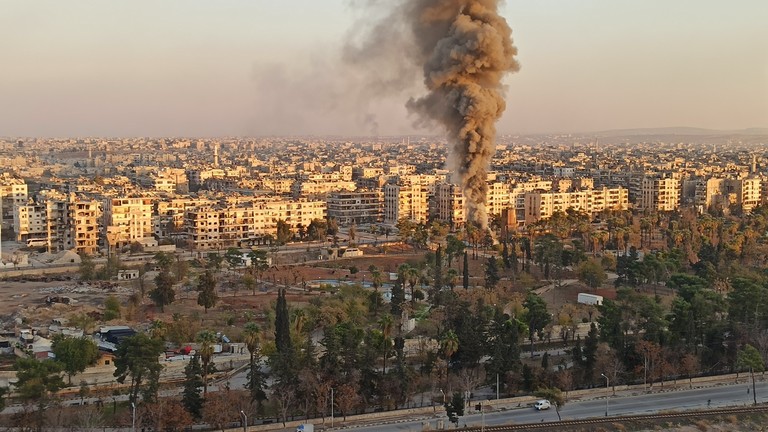 Smoke rises from the area following an unidentified airstrike on Aleppo, Syria on November 30, 2024. © Khatip Idlibi / Anadolu via Getty Images