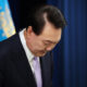 FILE PHOTO: South Korean President Yoon Suk-yeol bows during a press-conference. © Getty Images / Kim Hong-ji